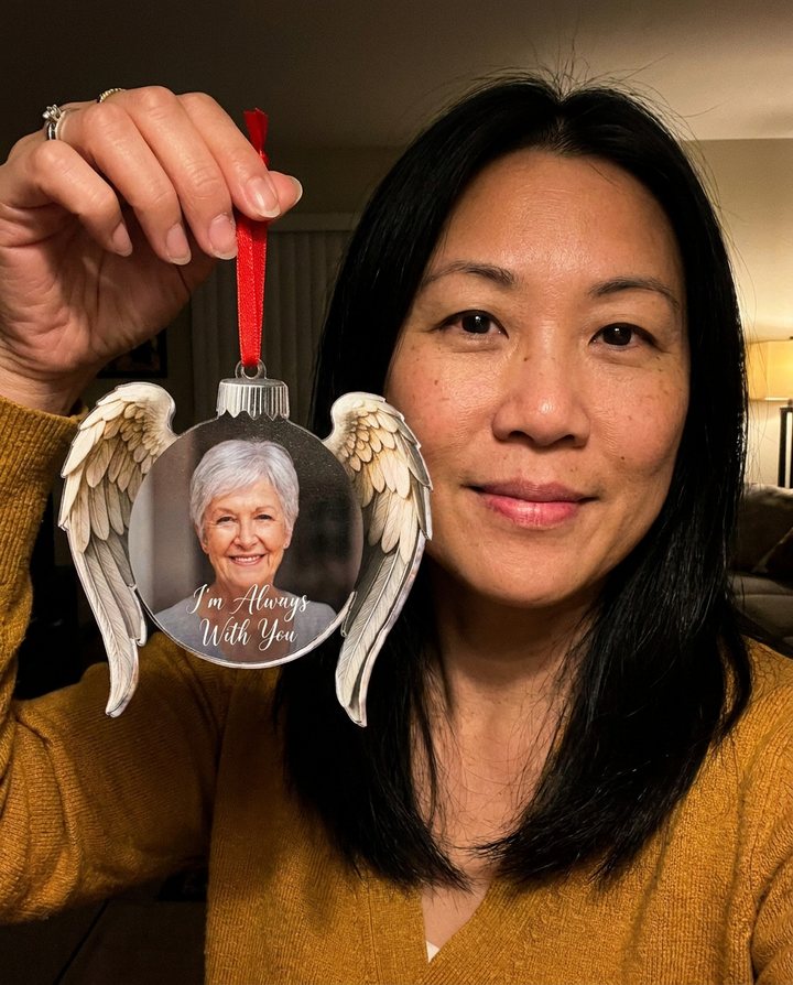 A customer with the Always Near Ornament