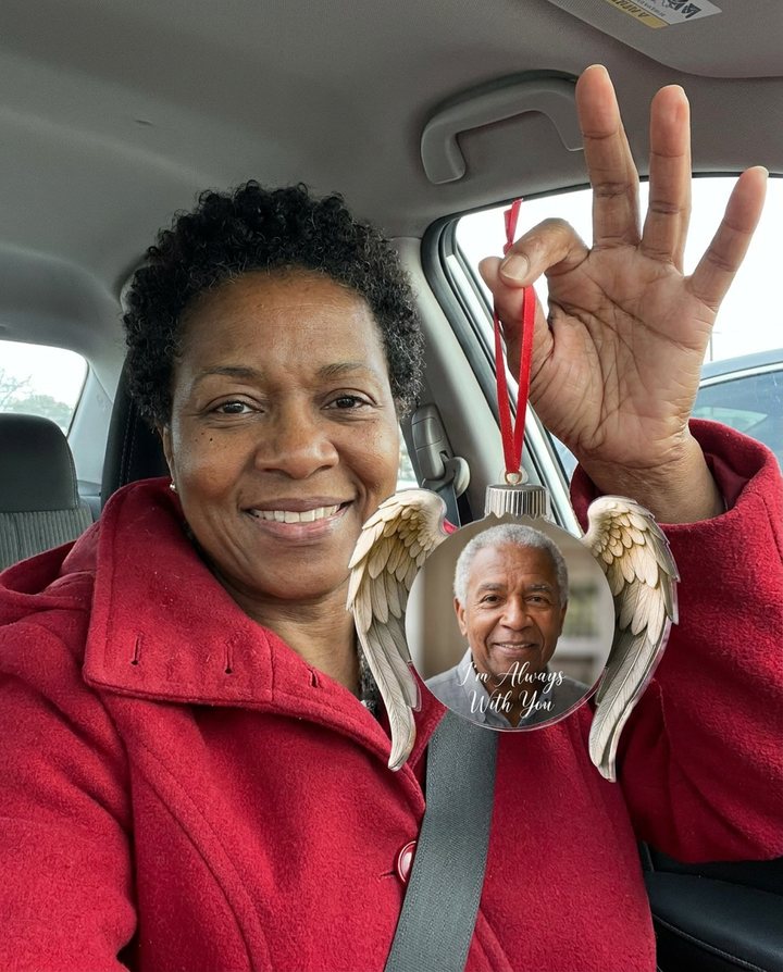 A customer with the Always Near Ornament