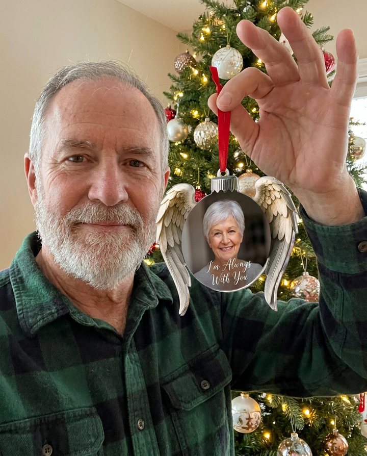 A customer with the Always Near Ornament