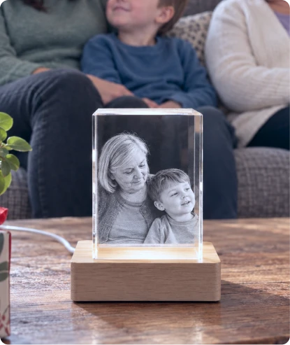 The finished Living Memory Crystal glowing on its timber light base